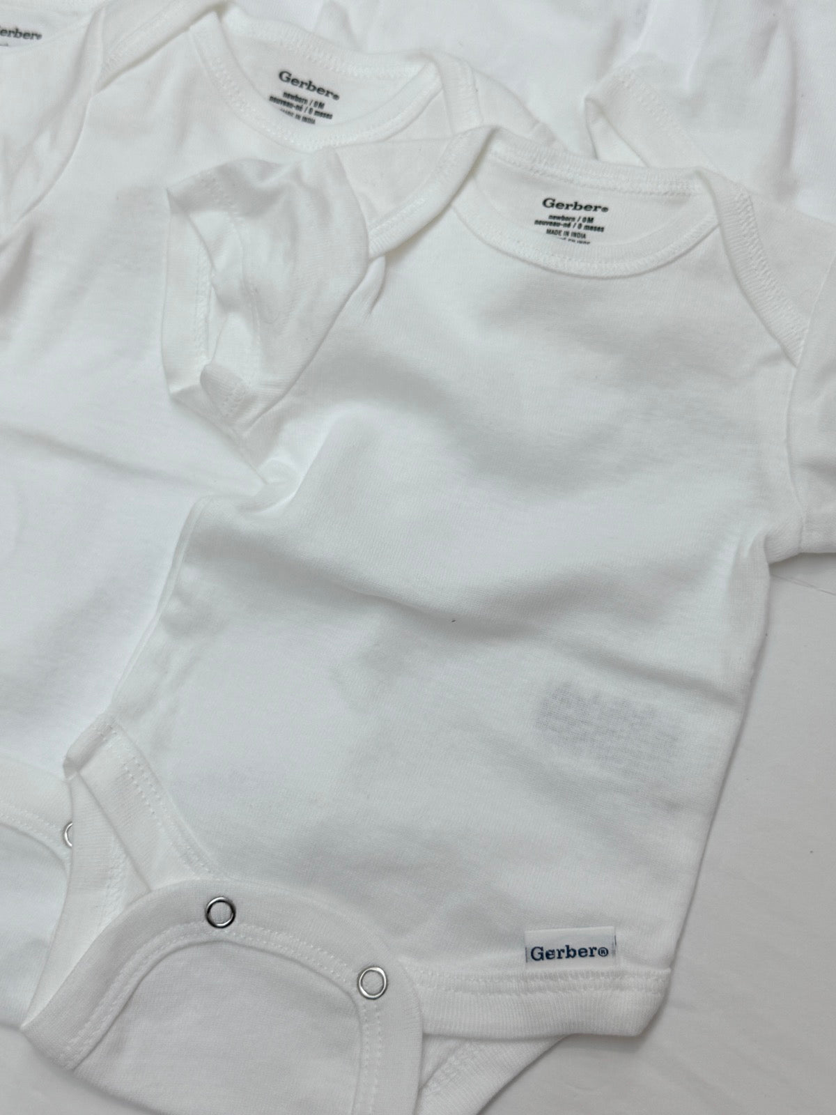 Gerber White Onesie 6-Pack Newborn 2 in Stock