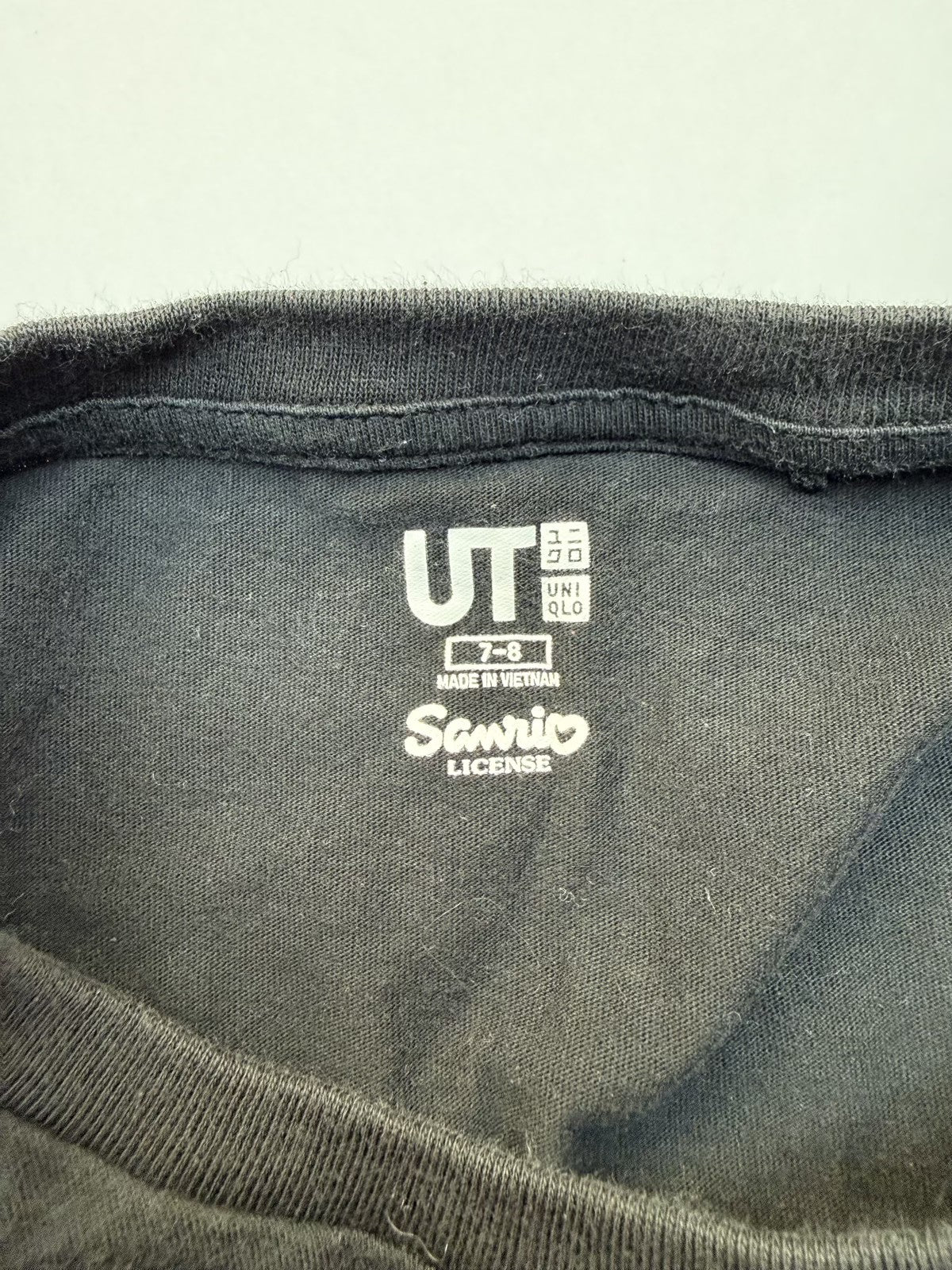 Uniqlo UT Hello Kitty Black Tee Size 7-8