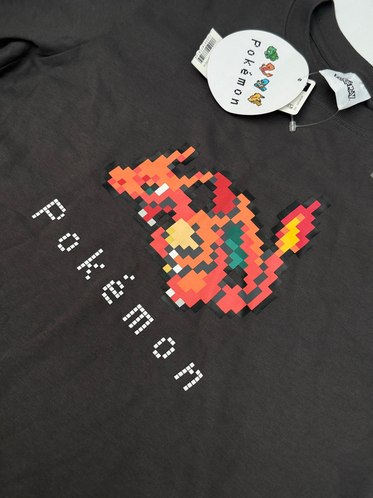 GU x Pokemon Charizard Pixel Graphic Tee Size 10-12Y
