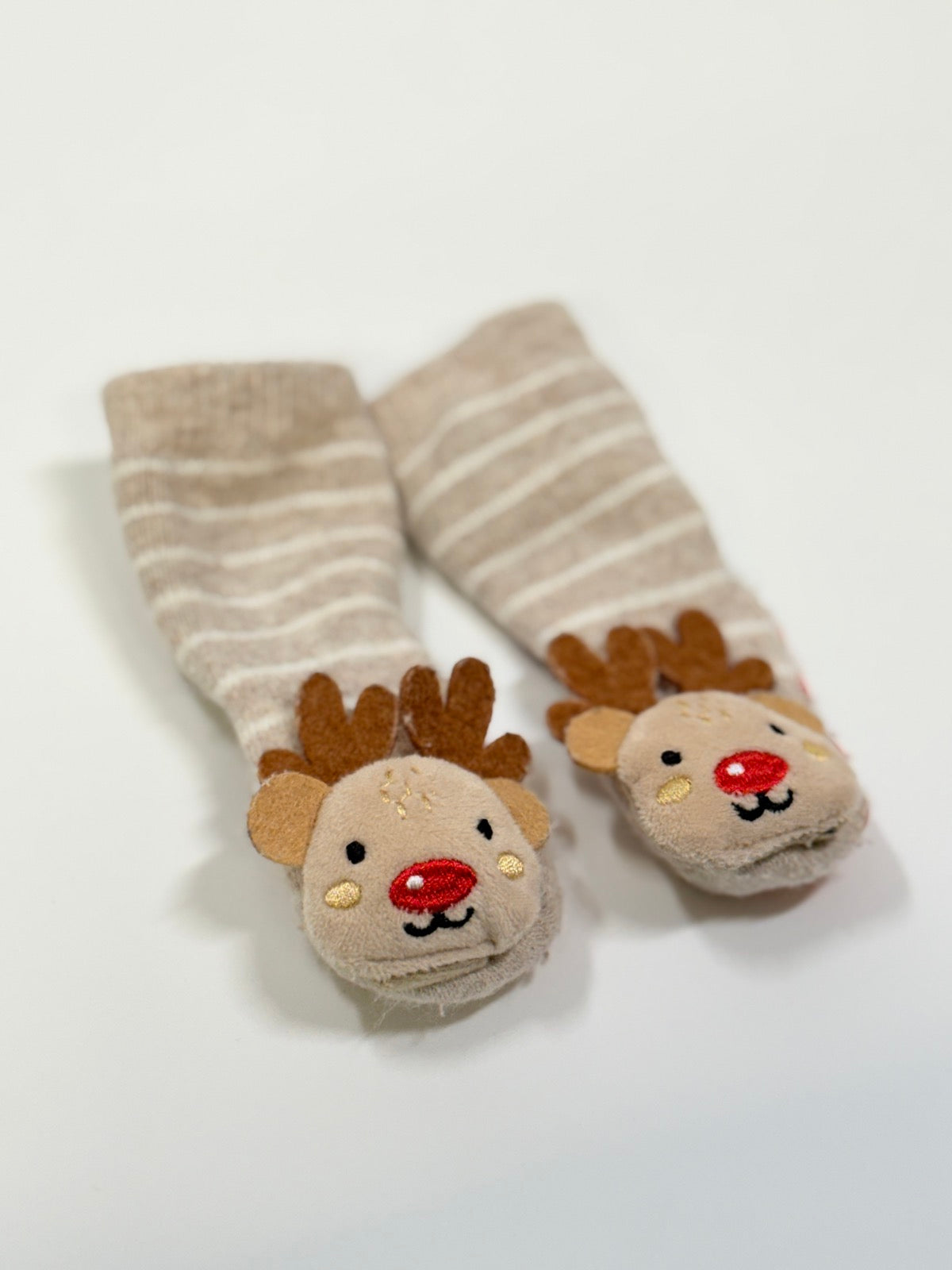 These JINGLE Rudolph Reindeer Baby Slipper Socks 0-3m