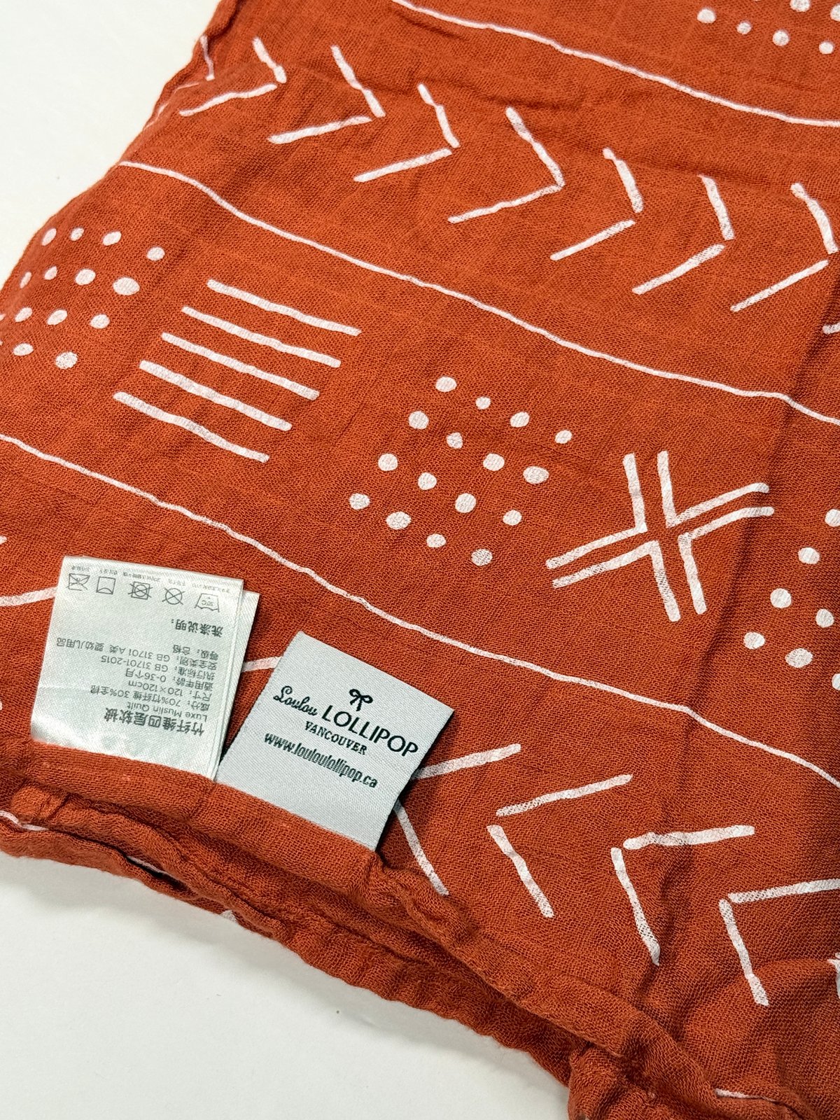 Loulou Lollipop Rust Muslin Swaddle Blanket