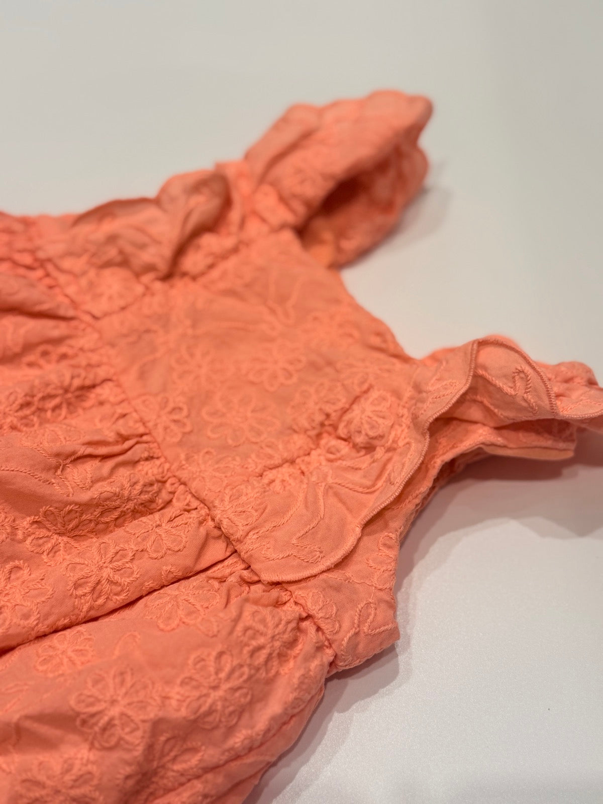 Cupcakes and Cashmere Peach Romper 6-9M