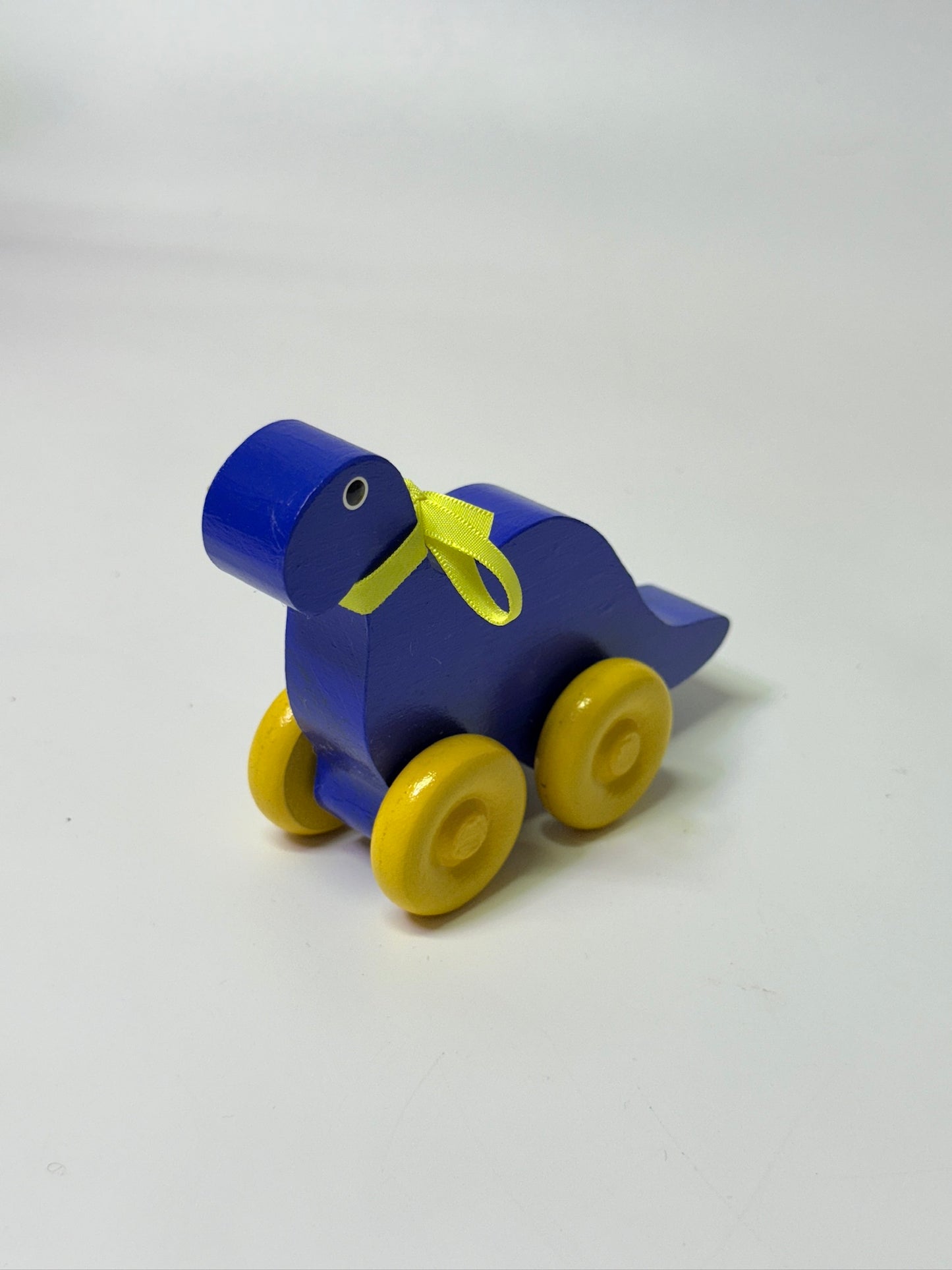 Wooden Wheeled Dinosaur