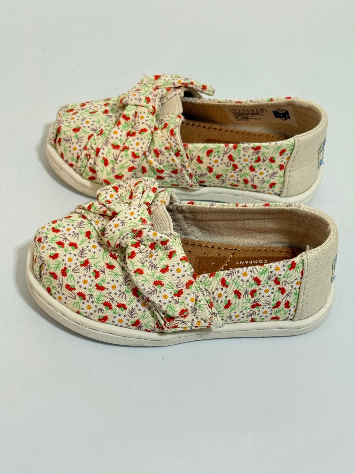 Floral Toms shoes 5c
