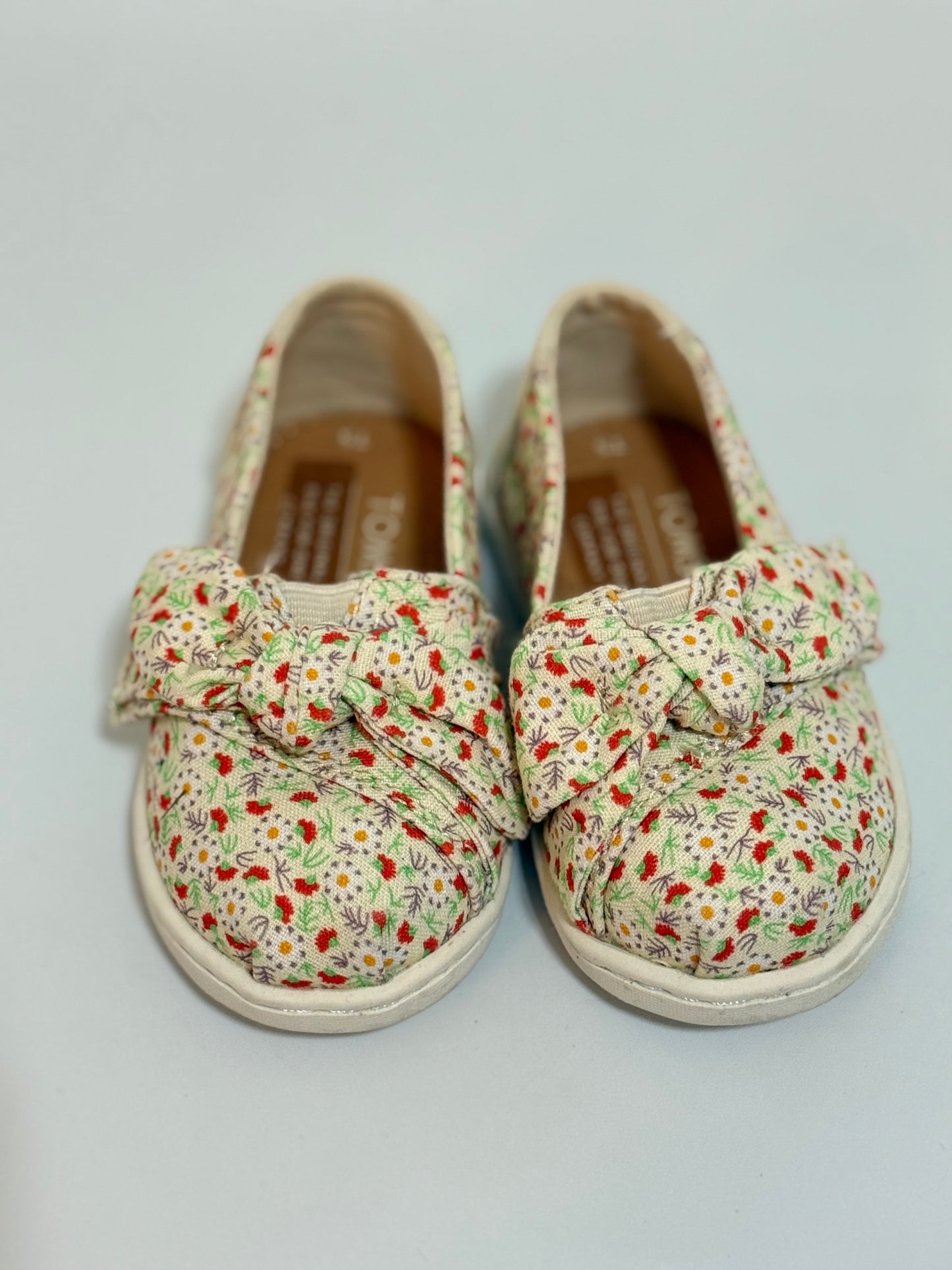 Floral Toms shoes 5c