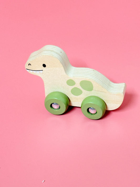 Carters Dinosaur on wheels