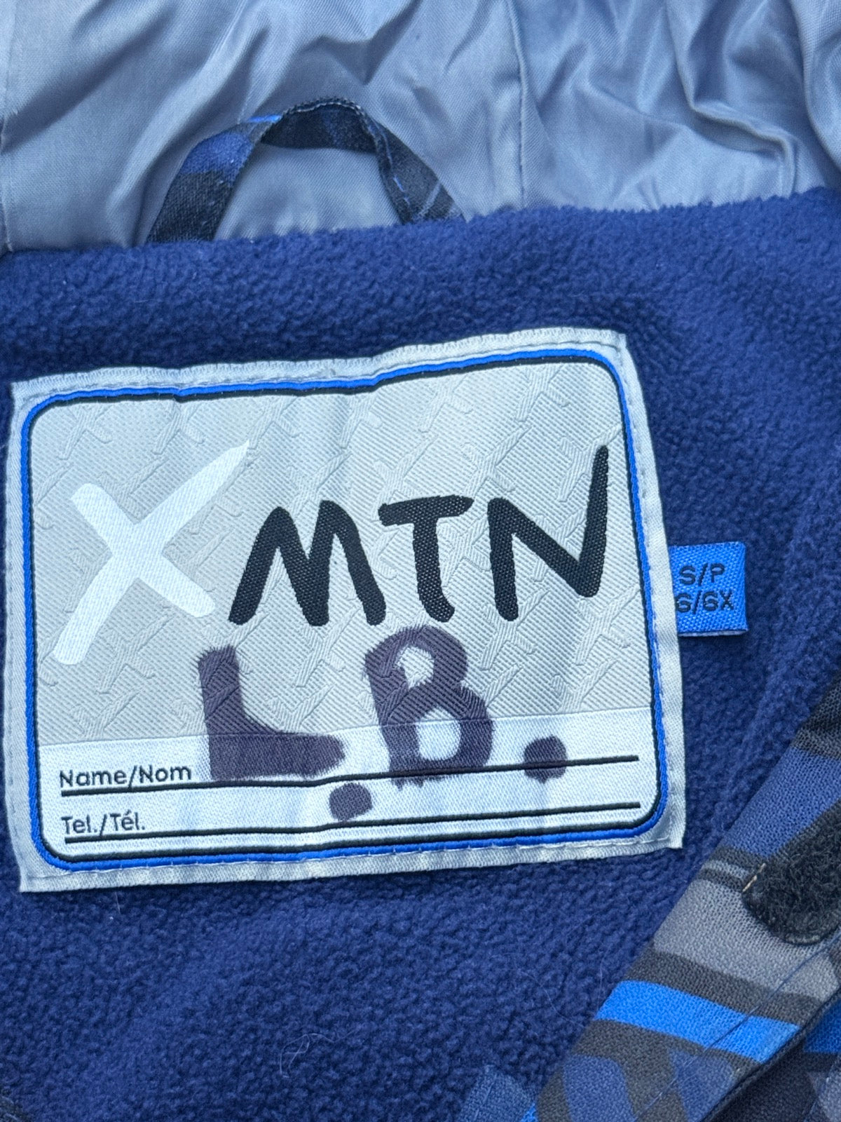 XMTN Blue Geometric Hooded Rain Jacket 6/6X